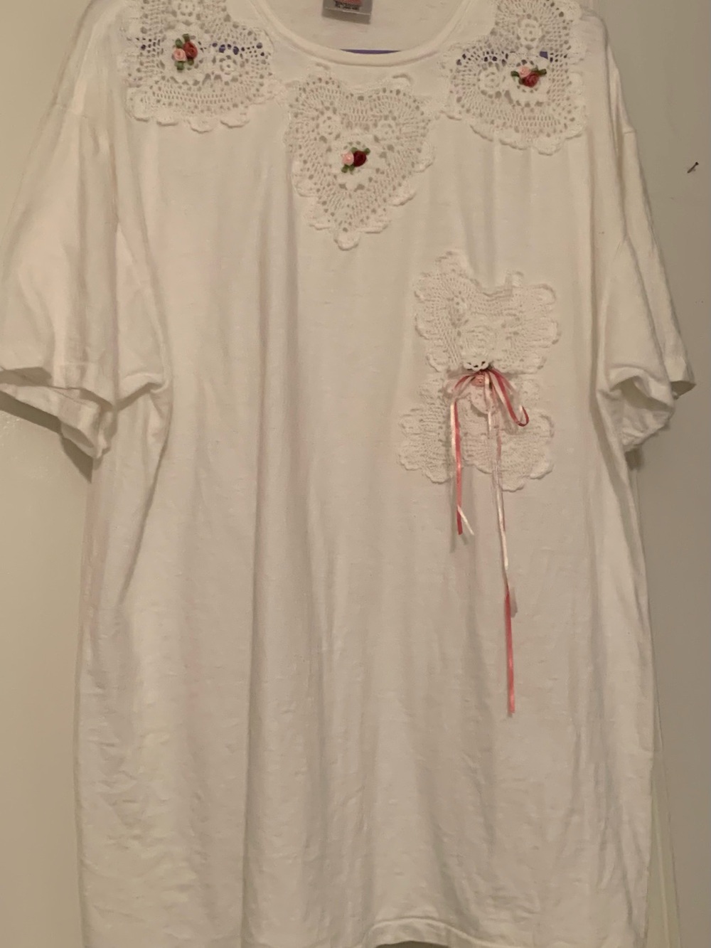 Women’s White Crochet Appliqué Tee with Pink Ribbon Accent